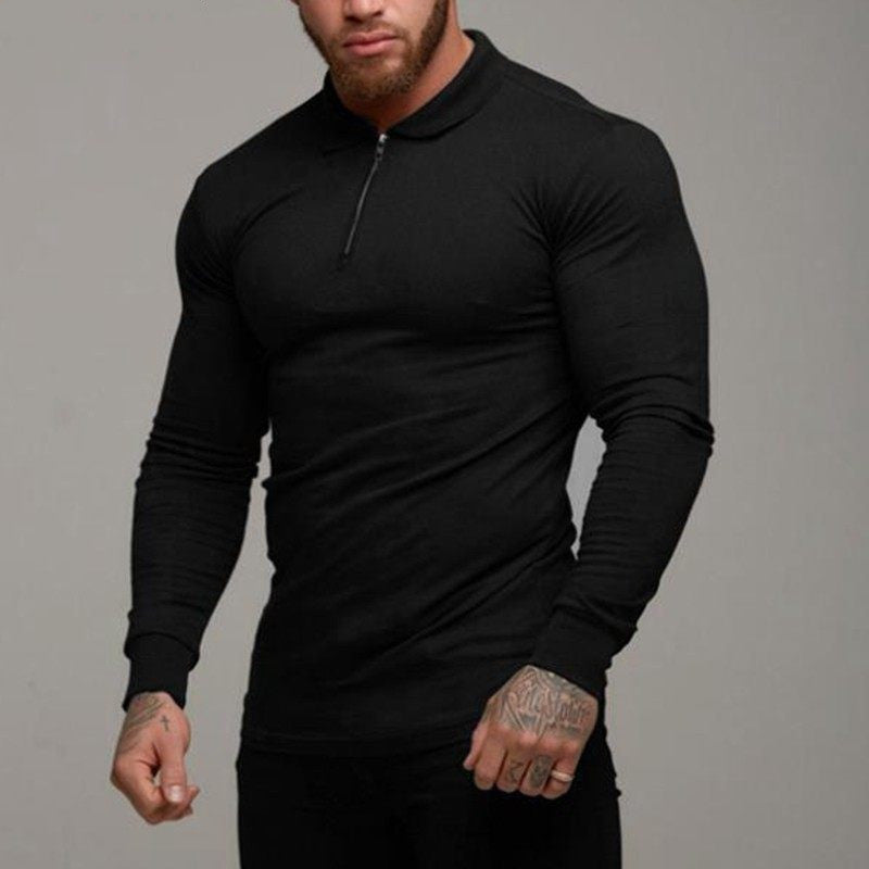 Man wearing a black long-sleeve shirt against a gray background
casual everyday wear
comfortable cotton t-shirt
lightweight long sleeve top
stylish casual shirt
basic wardrobe essential
