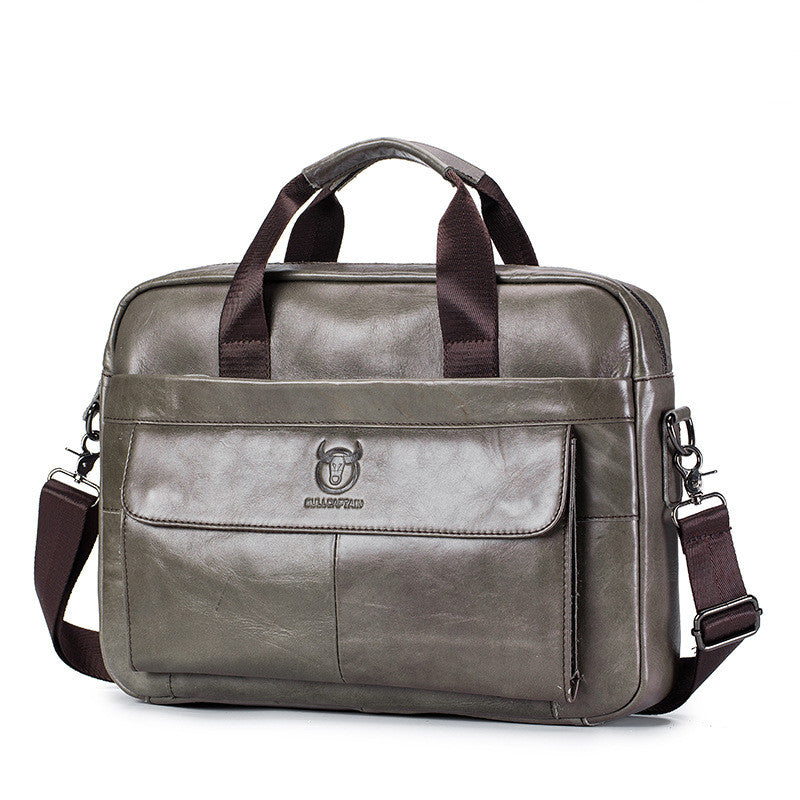 Gray leather briefcase with brown straps
executive briefcase
office messenger bag
premium leather bag
crossbody briefcase
business travel bag
leather office bag
luxury work briefcase